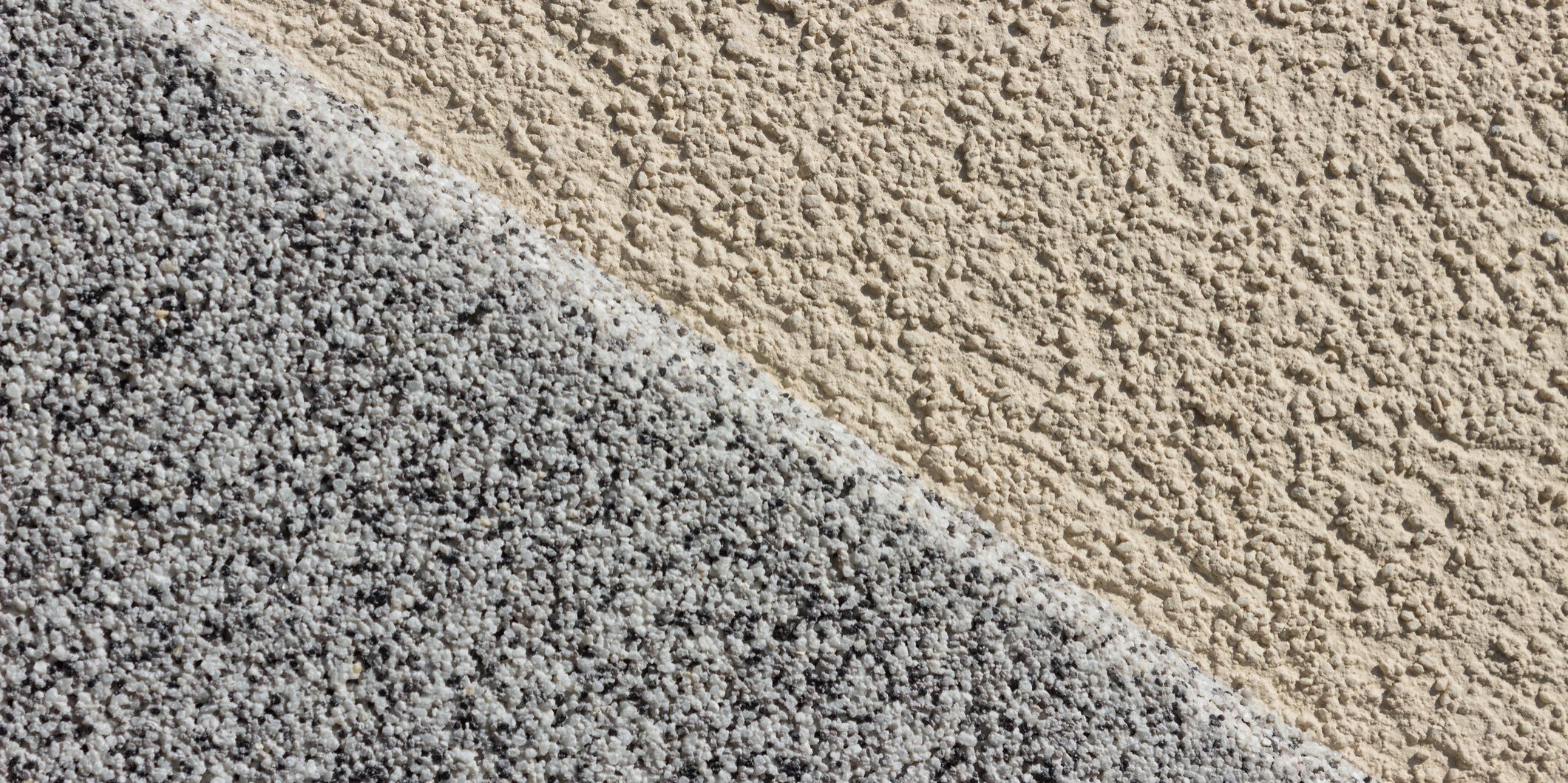 Wall with yellow and black / white plaster