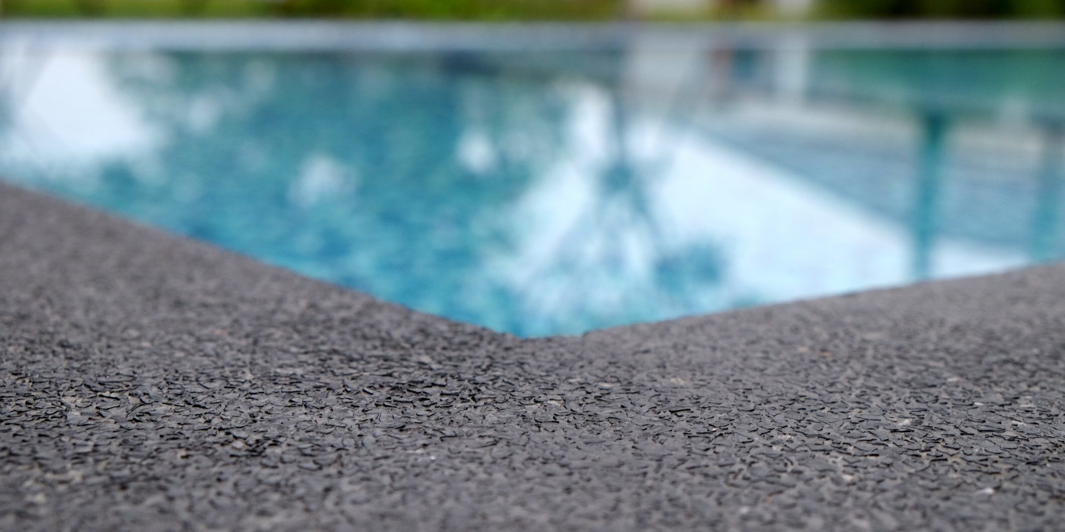 water swimming pool with sunny reflections